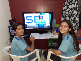 Foto: Alana Chaves, do 6º ano, e Alan Tavares, do 7º ano, estudam na Escola Estadual Professora Anésia | Fotógrafo: Eliseu Dias